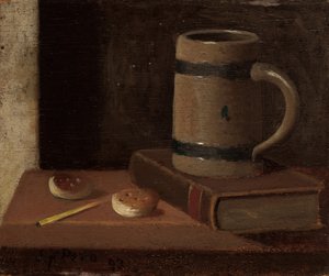Tasse, livre, biscuits et allumette
