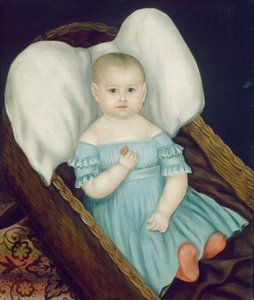 Bébé dans un panier en osier