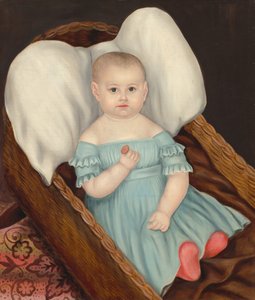 Bébé dans un panier en osier