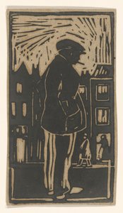 Homme debout dans une rue