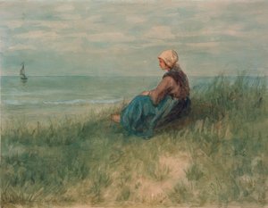 Fille dans les dunes regardant au loin