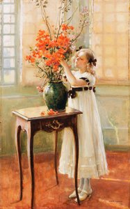 Une jeune fille arrangeant des fleurs de printemps