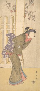 Le quatrième Iwai Hanshiro en femme sous un torii, vers 1791