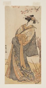 Acteur Segawa Tomisaburo II en tant que grande courtisane debout dans une pièce - Katsukawa Shunsho
