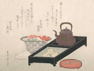 Ustensiles pour le thé et un bol à gâteau