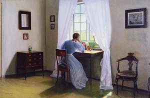 Femme devant la fenêtre