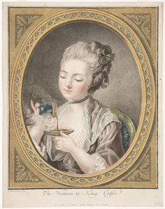 La femme prenant du café