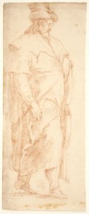 Homme en manteau marchant vers la droite