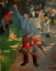 Homme perroquet au zoo d