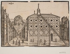 Rue, au premier plan mosquée et minaret isolé