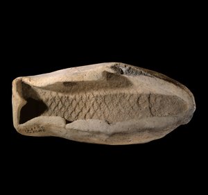 Mésopotamie : moule en terre cuite en forme de poisson - Mesopotamian