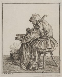 Une femme se réchauffe