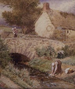 Femme lavant des vêtements dans un ruisseau
