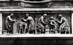 Relief représentant des artistes et des artisans au travail