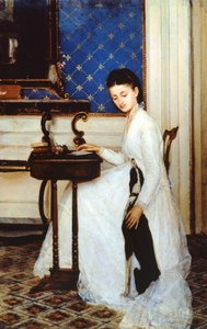 Jeune femme au bureau avec lévrier