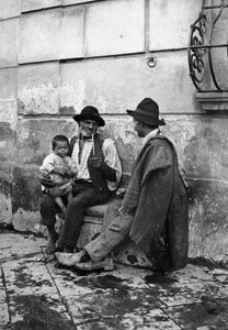 Vieil homme avec une pipe, homme et enfant