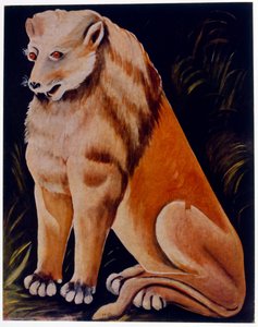 Jeune lion assis