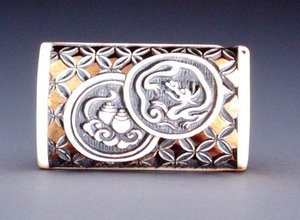 Netsuke avec design ajouré - Ozaki Kokusai