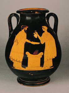 Un couple verse une libation au-dessus d