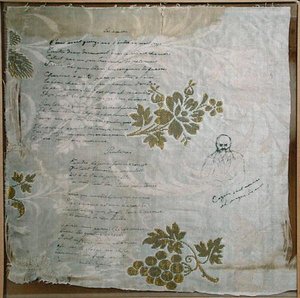 Morceau de nappe sur lequel Verlaine a écrit ses poèmes 