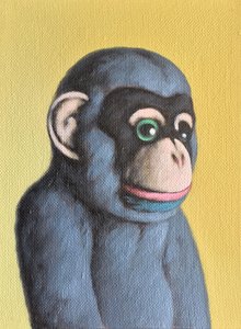 Singe mauve sur jaune
