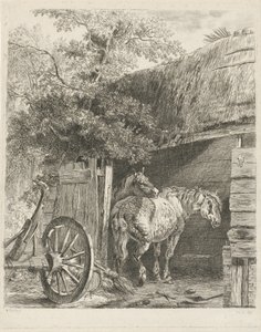 Deux chevaux dans une grange