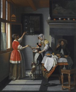 Intérieur avec un enfant nourrissant un perroquet