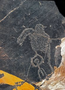 Préhistoire, art rupestre : roche funéraire avec figure humaine. Âge de pierre 5000-2000 av. J.-C. Taghit, Haut plateau du Hoggar (Ahaggar), Algérie - Prehistoric Prehistoric