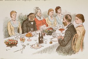 Personnes assises à une table à manger.