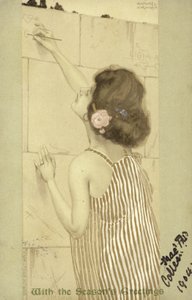Fille écrivant sur un mur