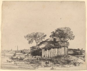 Cottage avec une palissade blanche