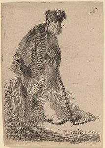 Homme en manteau et bonnet de fourrure appuyé contre une berge