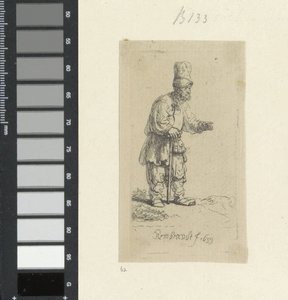 Paysans debout avec un grand chapeau, appuyé sur un bâton - Rembrandt van Rijn