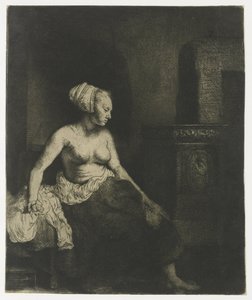 Femme assise à moitié habillée près d