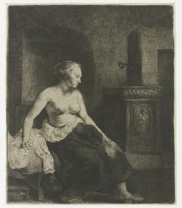 Femme assise à moitié habillée près d