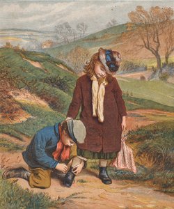 Un ami dans le besoin, un garçon attachant les chaussures d