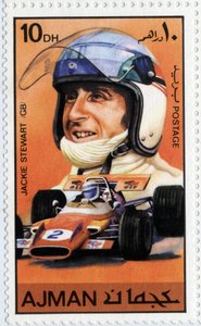 Timbre des Émirats représentant le pilote de voiture écossais Jackie Stewart (né en 1939) - School Arabic