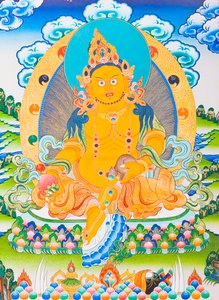 Image représentant Dzambhala, le Dzambhala jaune est la manifestation du Bouddha Ratnasambhava symbolisant la richesse dans le monde matérialiste
