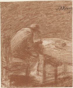 Homme écrivant à une table