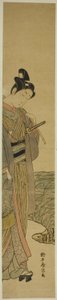Jeune homme avec canne à pêche et filet