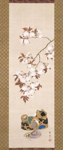 Cerises et boîte en forme de chien