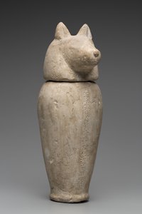 Vase canope à tête de chacal (calcaire)