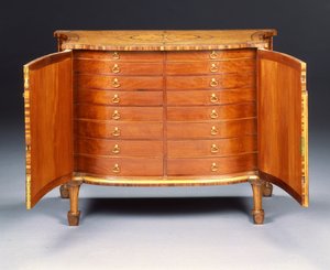 Une des deux commodes George III (bois de lièvre et bois de rose) - Thomas Chippendale