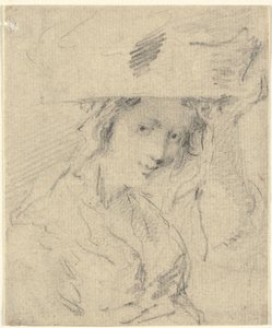 Femme avec un panier sur la tête