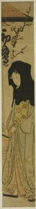 Femme portant une capuche noire devant la maison de thé Hatsutaka