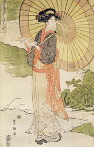 Femme debout avec un parasol