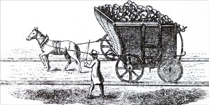 Un cheval tirant un chariot de charbon