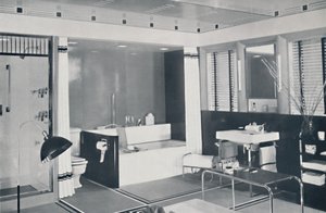 Crane Co. - Un schéma noir, blanc, rouge et gris avec un sol en carreaux de céramique non émaillés, blanc-huître