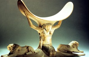 Appuie-tête en ivoire soutenu par une figure, Égyptien ancien, 18ème dynastie, vers 1325 av. J.-C.
