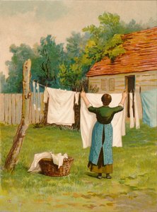 Femme étendant du linge, fin 19e-début 20e siècle